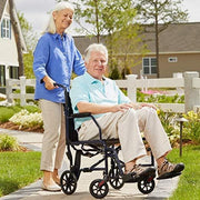 Carex Lightweight Transport Foldable Wheelchair with Footrests - Senior.com Transport Chairs
